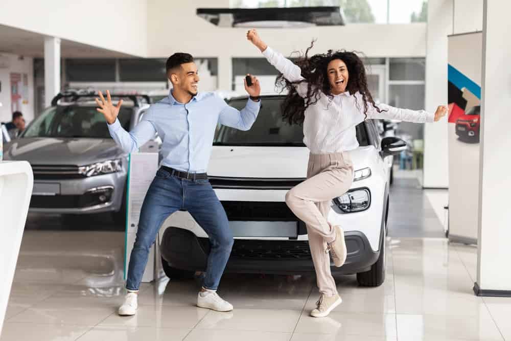 Couple are excited to buy a car