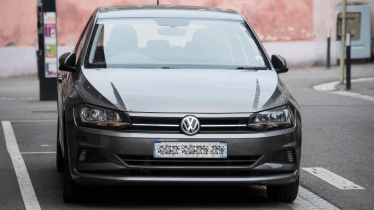 Dark grey VW Polo TSI Life front view.