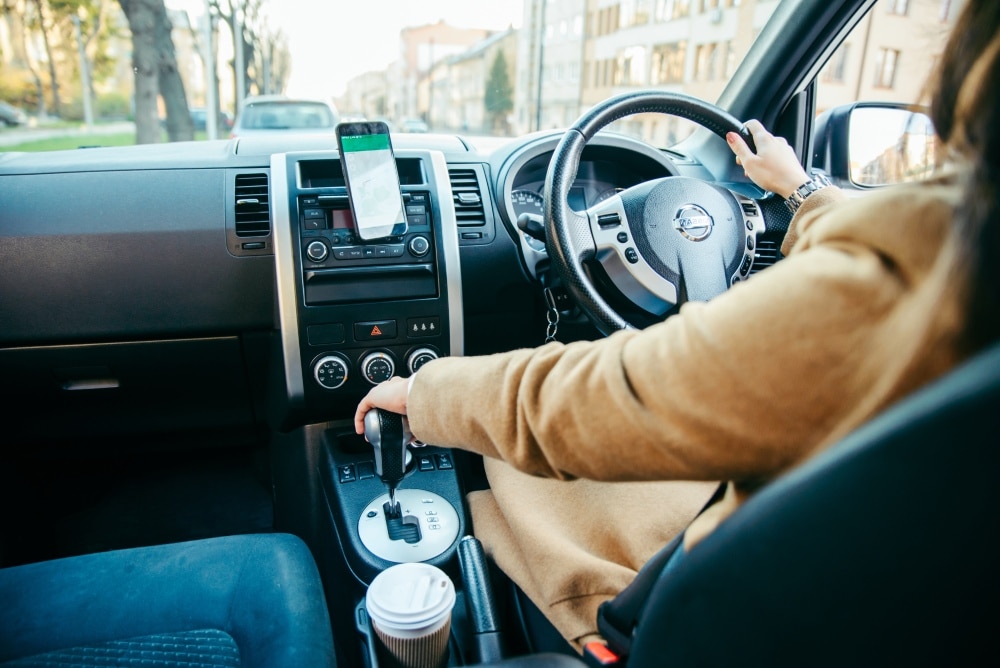 Woman drives an automatic car