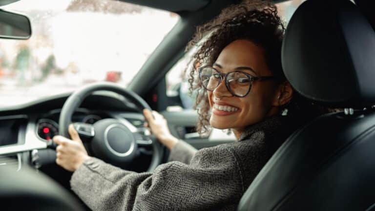 Woman test drives a used fuel car