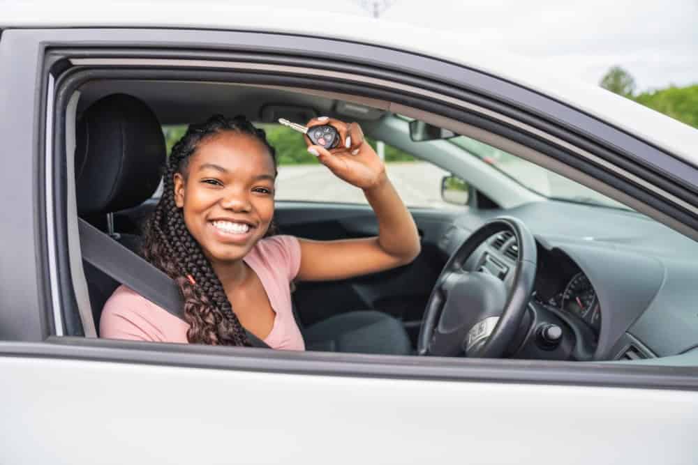 Young driver is excited to buy her first car