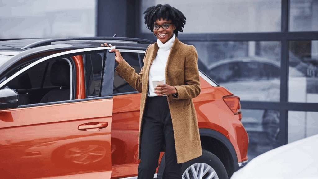 Woman browses used fuel cars and used electric cars for sale