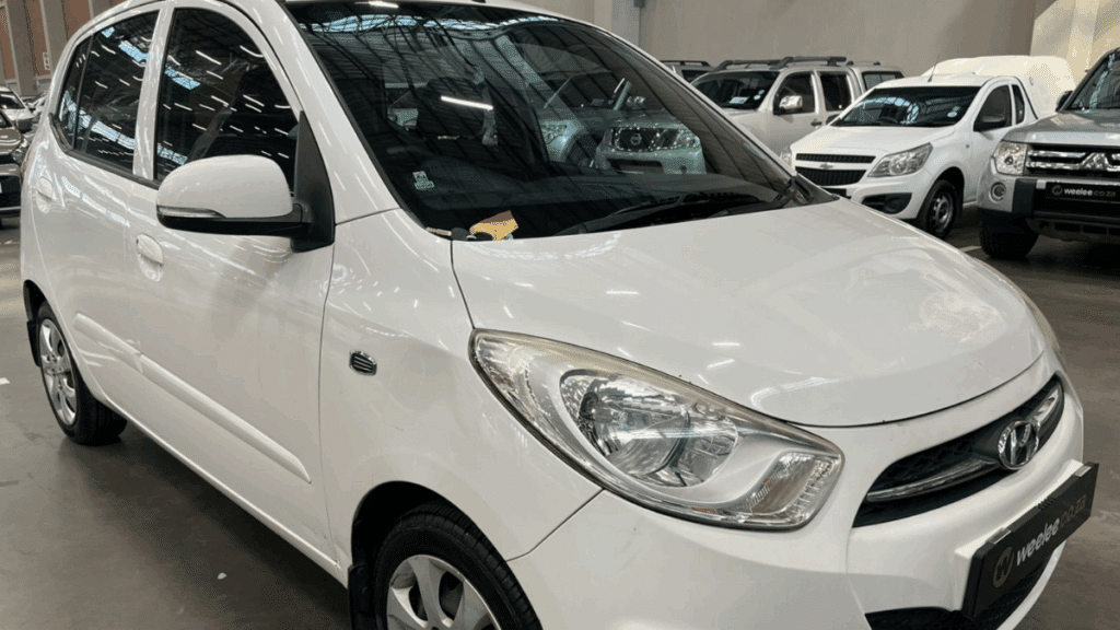White Hyundai compact hatchback, ideal model to buy a used car with instalments around R2,000
